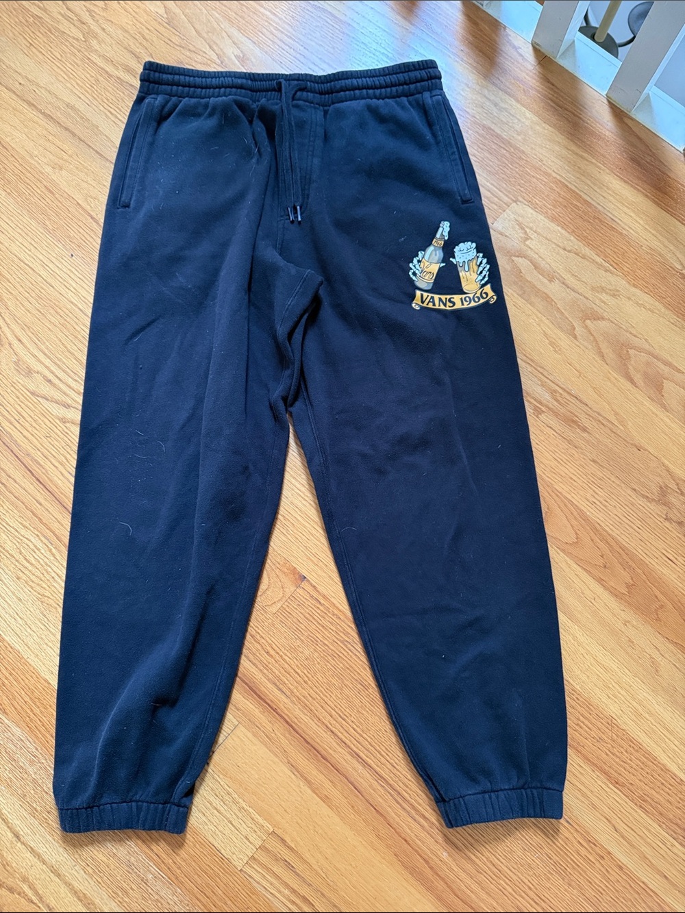 Vans Black Sweatpants with Yellow Graphic Patch